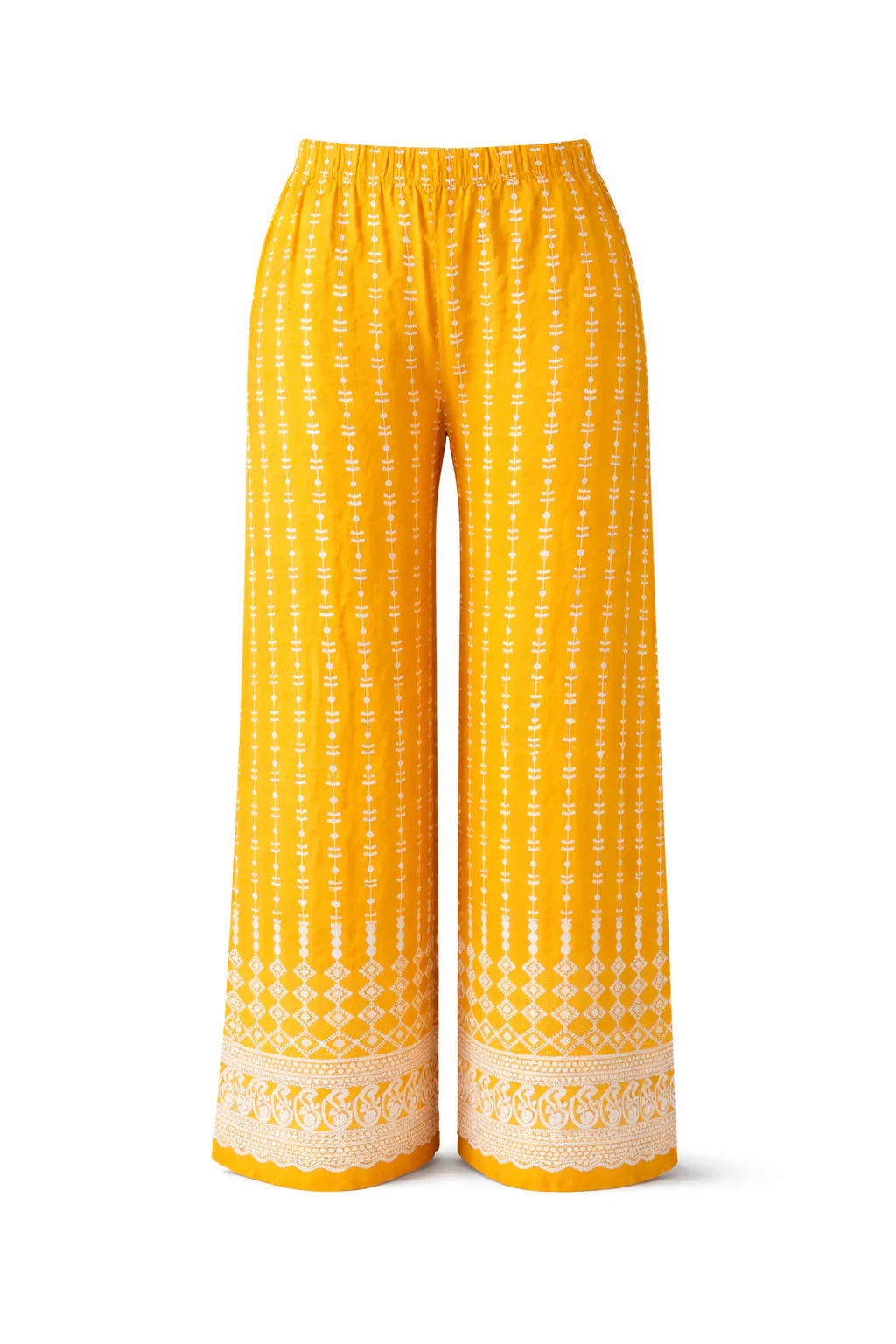 Yellow printed wide leg pants with white ethnic patterns and elastic waist on white background
