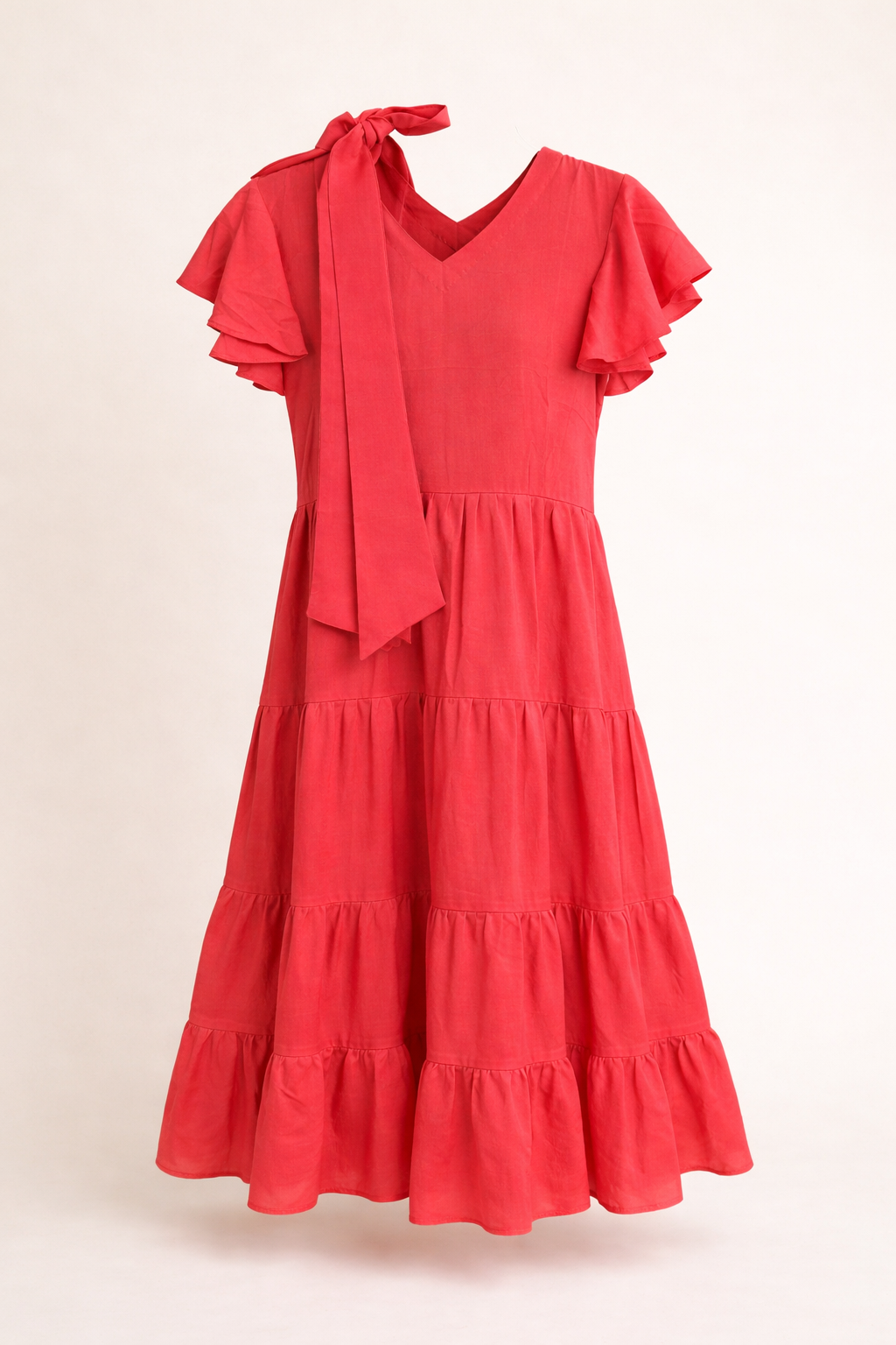 Girls ruffle sleeve tie-neck tiered pink dress
