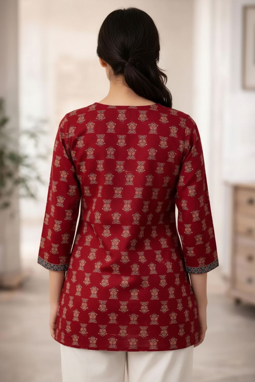 Maroon printed top back view showing gold block print pattern
