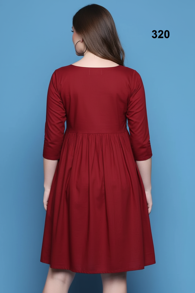 Maroon burgundy gathered midi dress back view showing gathered waist and flowing skirt