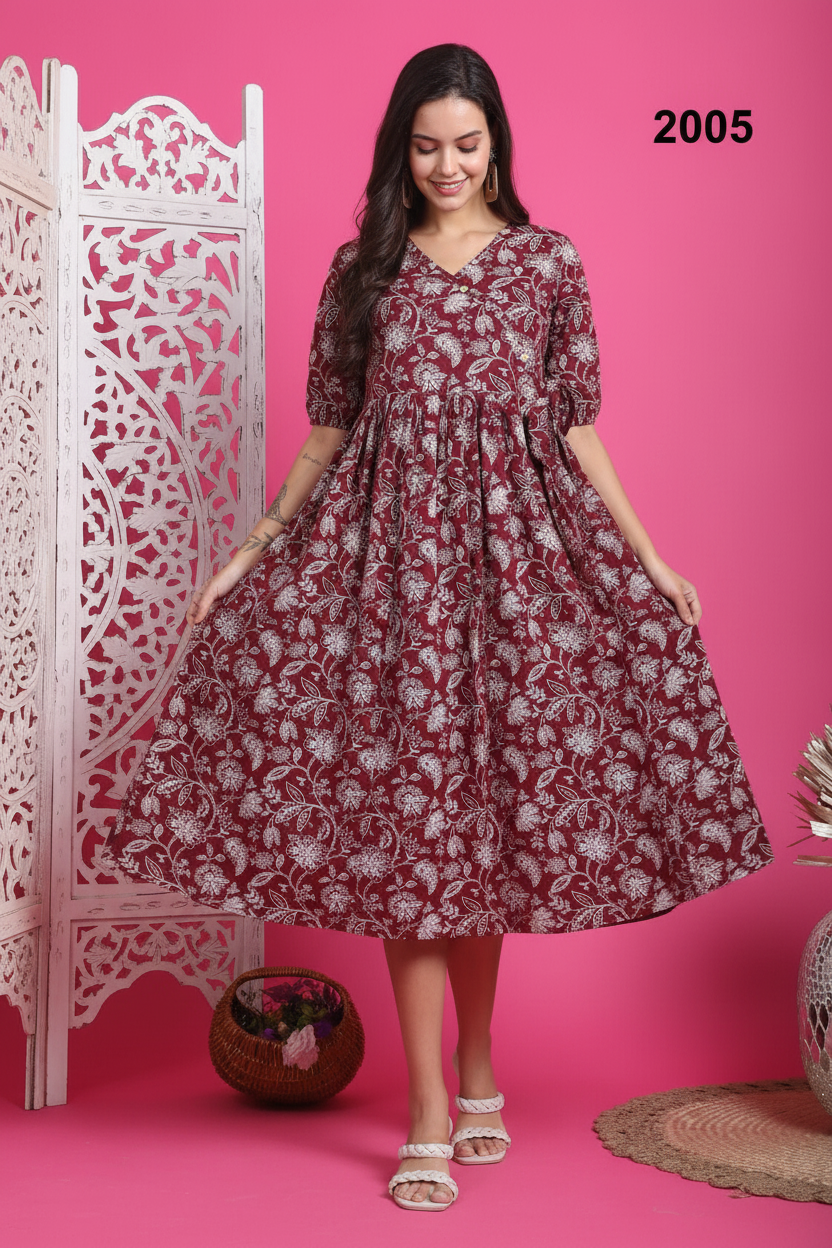 Model touching fabric of maroon floral dress - lifestyle shot