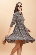 Black white geometric dress showing flare and movement - flowing skirt